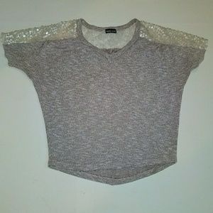 Short sleeve knit shirt with sequin detail